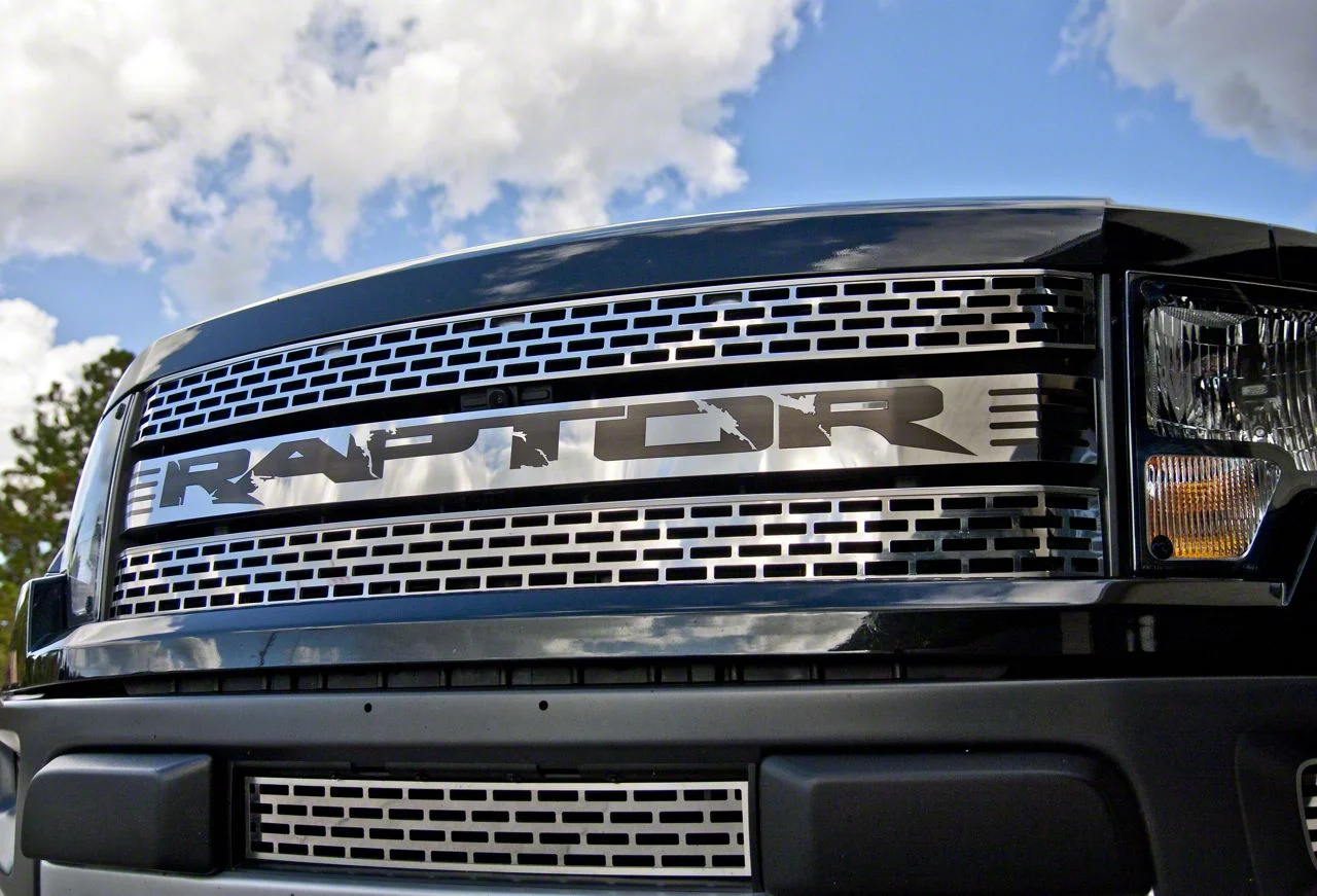 Grille Emblem Overlay with RAPTOR Lettering; Polished (10-14 F-150 Raptor)