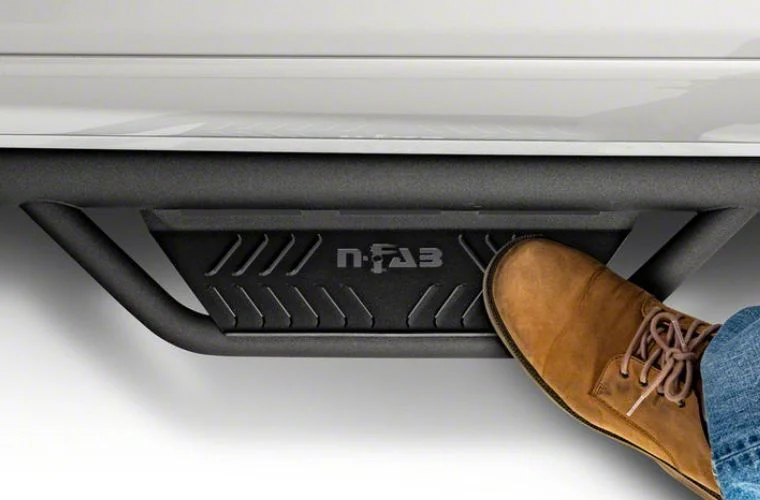 N-Fab Cab Length Podium Nerf Side Step Bars; Textured Black (15.5-18 RAM 1500 Quad Cab)