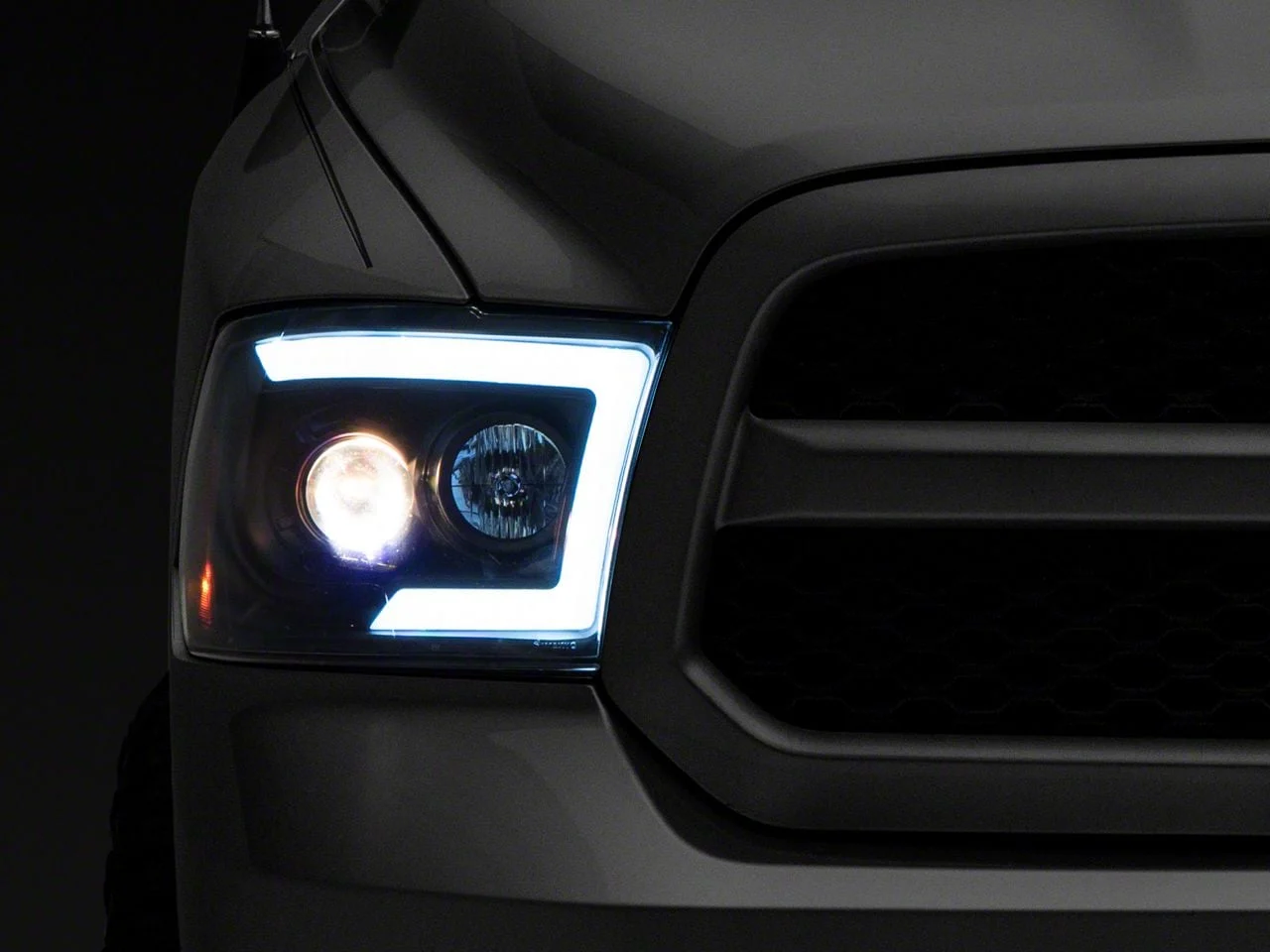 Switchback Sequential LED C-Bar Projector Headlights; Matte Black Housing; Clear Lens (09-18 RAM 1500 w/ Factory Halogen Non-Projector Headlights)