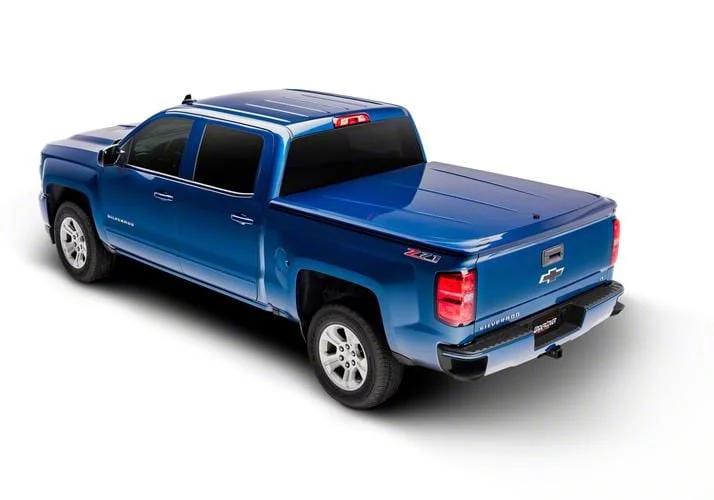 UnderCover SE Smooth Hinged Tonneau Cover; Unpainted (07-13 Sierra 1500 w/ 6.50-Foot Standard Box)